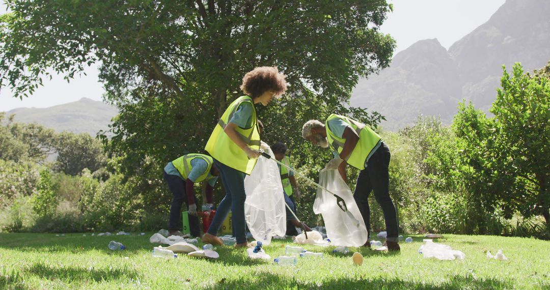 Group of Volunteers Cleaning Park and Collecting Plastic Waste - Free Images, Stock Photos and Pictures on Pikwizard.com