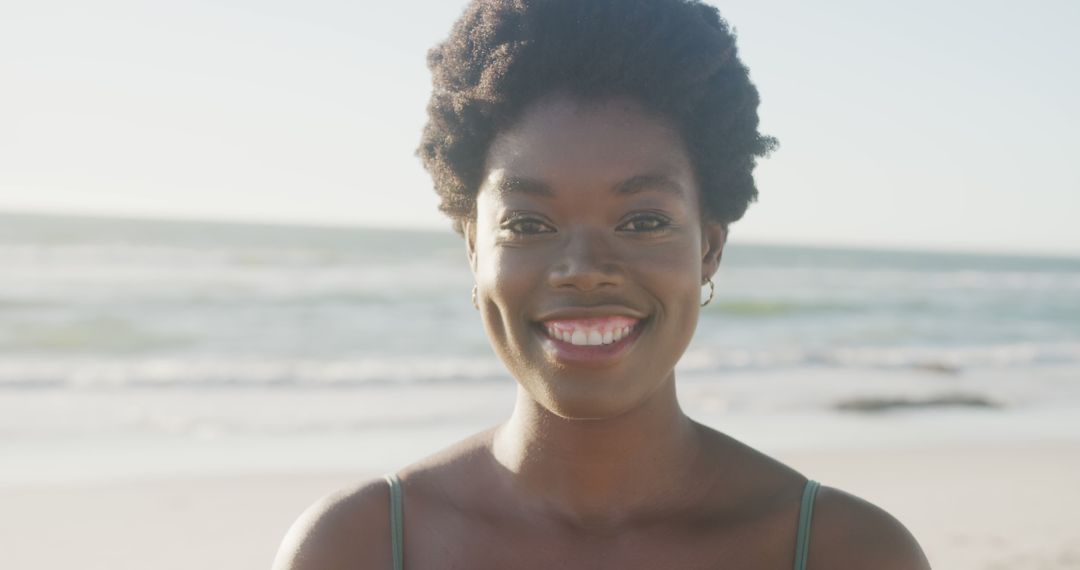Smiling Woman Enjoying Beach Sunset