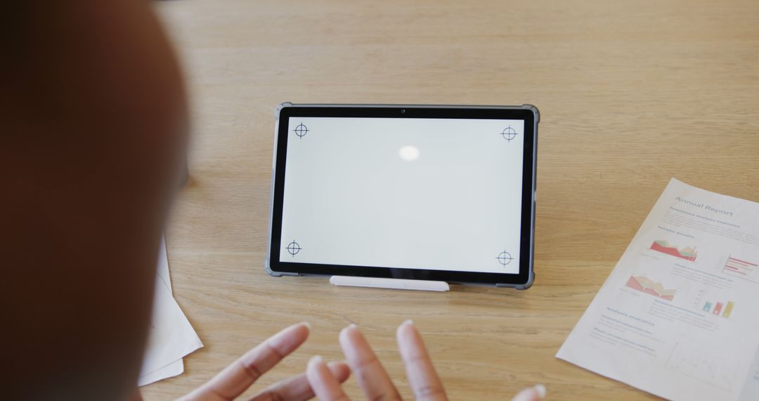 Person Using Digital Tablet With Blank Screen in Office Setting - Free Images, Stock Photos and Pictures on Pikwizard.com