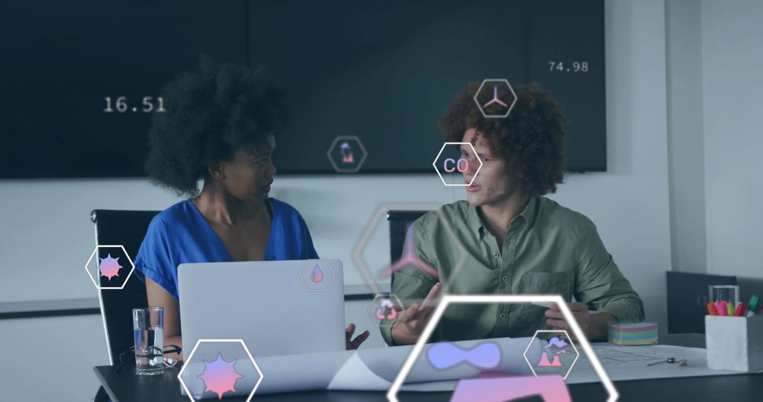 Business Professionals Engaging in High-Tech Data Analysis Meeting