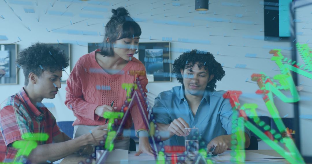 Innovative Team Collaborating on Technology Prototypes in Modern Office