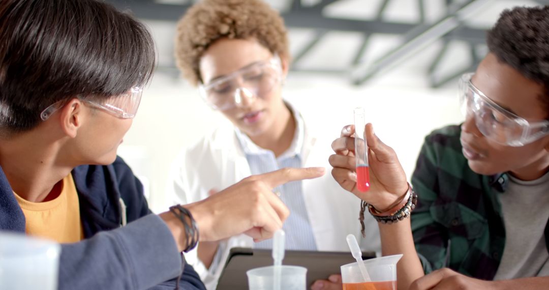 Teenagers Conducting Chemistry Experiment in Science Class