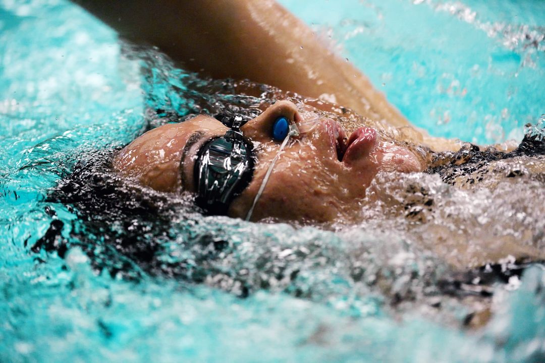 Close-Up of Competitive Swimmer Doing Backstroke - Free Images, Stock Photos and Pictures on Pikwizard.com