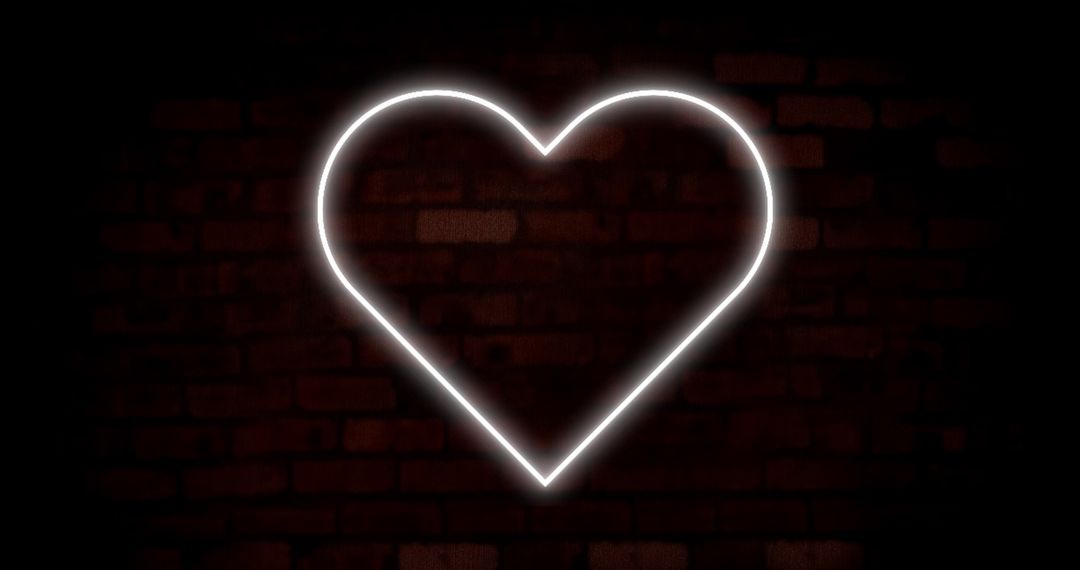 Neon Heart Glowing Against Dark Brick Wall - Free Images, Stock Photos and Pictures on Pikwizard.com