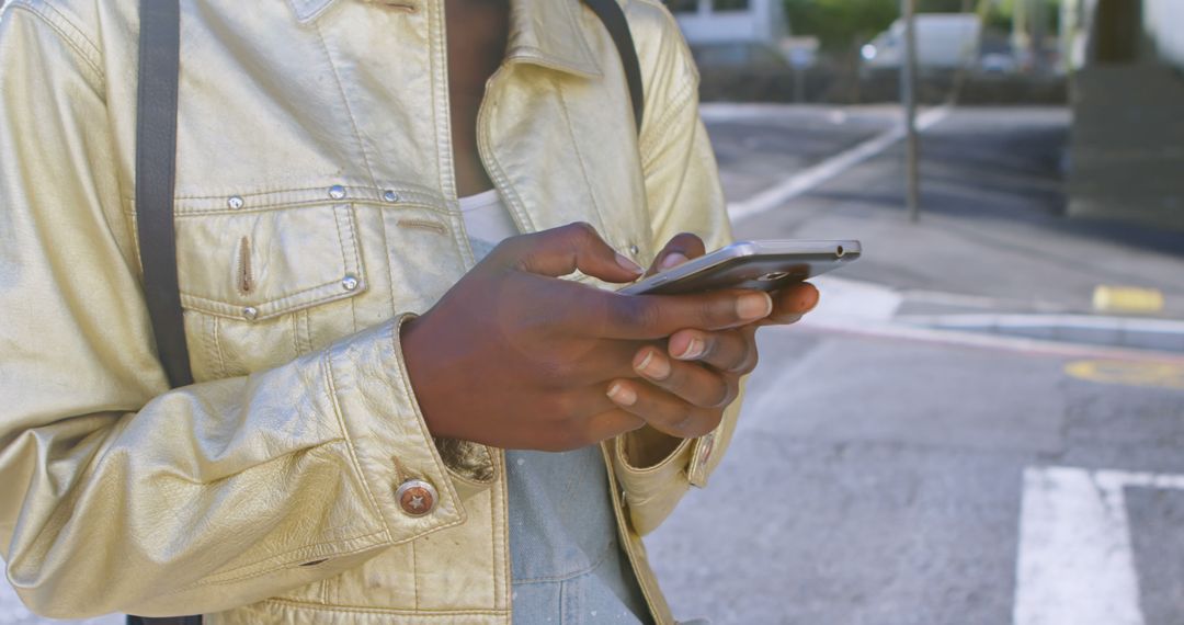 Close-up of person using smartphone outdoors in urban area - Free Images, Stock Photos and Pictures on Pikwizard.com