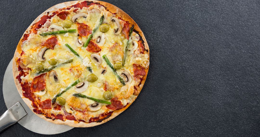 Vegetable Pizza with Cheese on Dark Surface