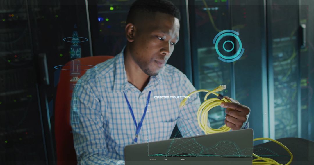 African American IT Engineer Analyzing Network Cables in Serve Room