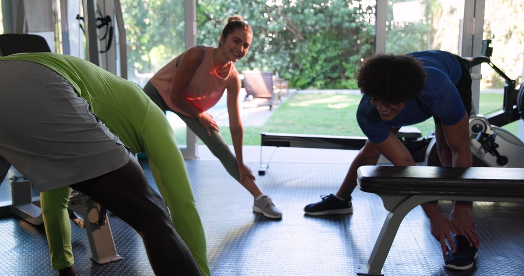 Group Stretching and Preparing for Workout in Gym