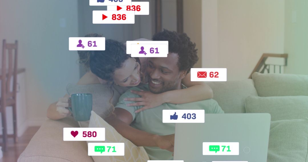 Smiling Couple Using Laptop with Digital Communication Icons