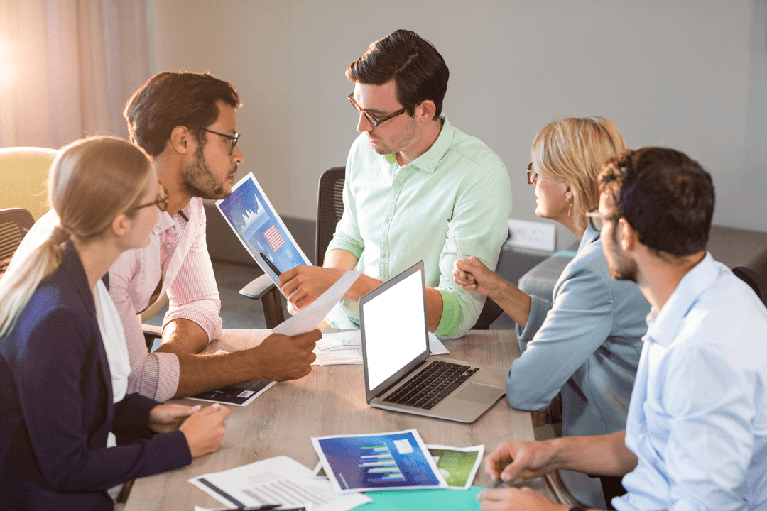 Creative Team Analyzing Transparent Marketing Materials in Office