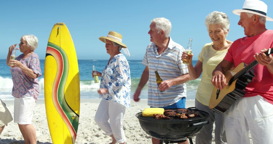 Senior Friends Enjoying Beach Barbecue with Surfboard - Free Images, Stock Photos and Pictures on Pikwizard.com