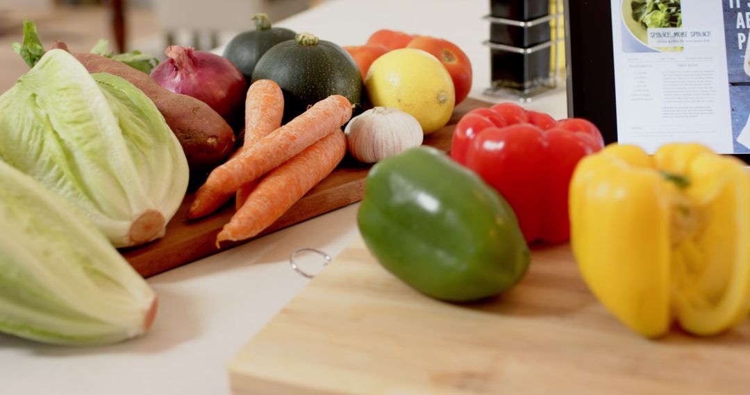Fresh Vegetables on Kitchen Counter with Recipe Tablet