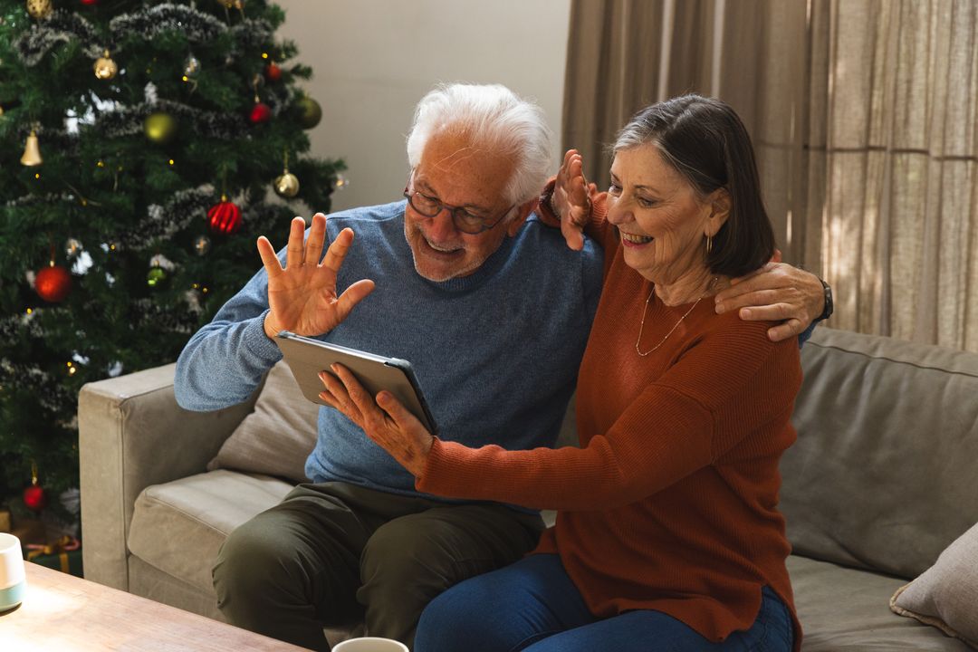 Senior Couple Connecting Virtually During Holidays at Home