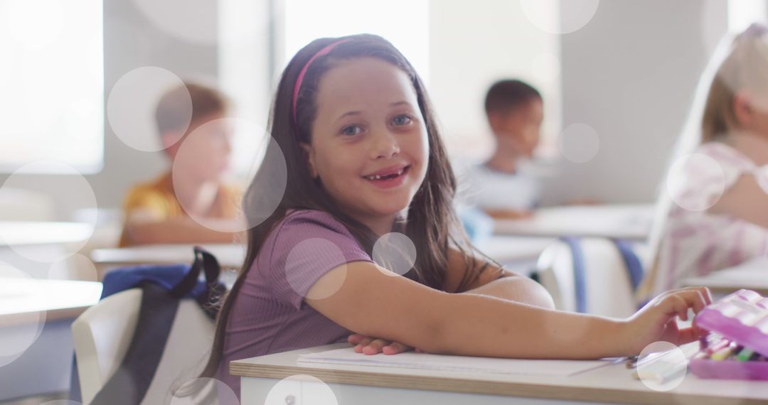 Smiling Girl in Classroom with Blurred Background - Free Images, Stock Photos and Pictures on Pikwizard.com