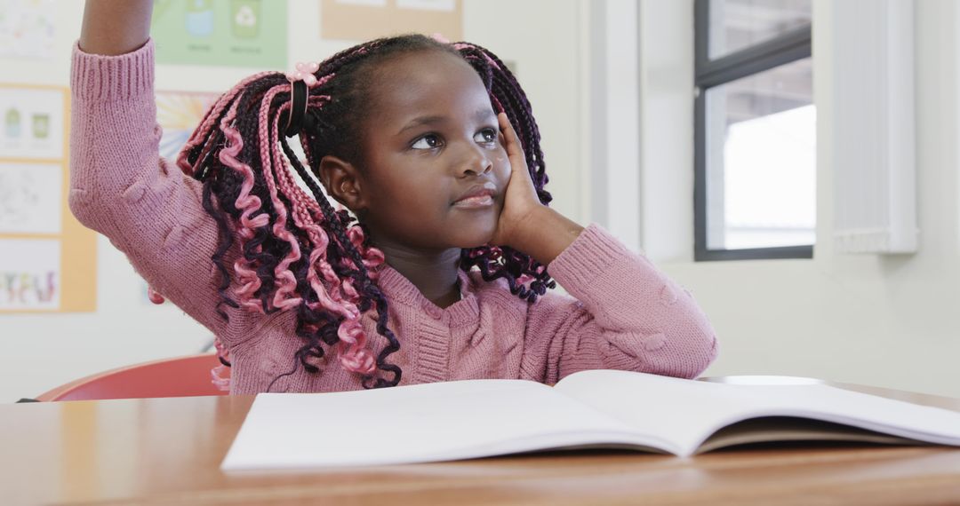 Curious Girl in Classroom Raising Hand by Open Book