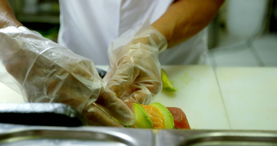 Chef's Hands Wearing Gloves Preparing Fresh Fruits - Free Images, Stock Photos and Pictures on Pikwizard.com