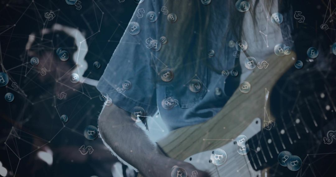 Strumming Guitarist in Faded Denim with Floating Bitcoin Bubbles and Moody Stage Lighting