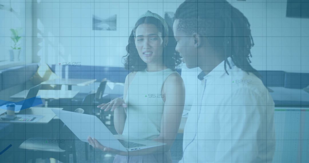 Office Colleagues Engaged in Teamwork with Technology Overlay