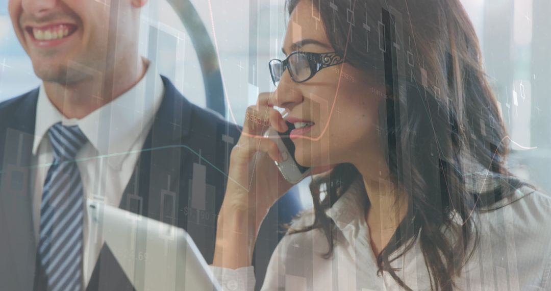 Confident Businesswoman Analyzing Data While on Call in Modern Office