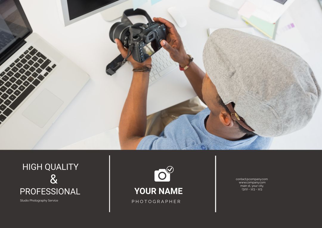 Professional Photographer Reviewing Camera Workspace Design