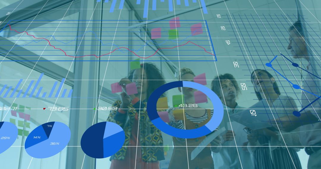 Colleagues Collaborating on Data Analysis and Visualization in Modern Office
