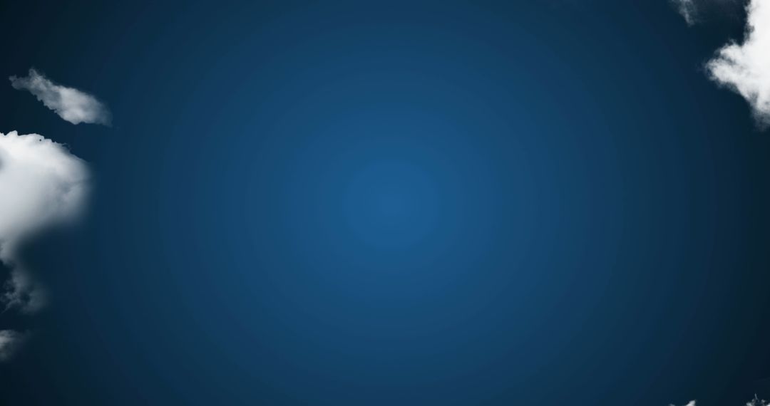 Pristine Blue Sky with Cotton Clouds and Ample Copy Space