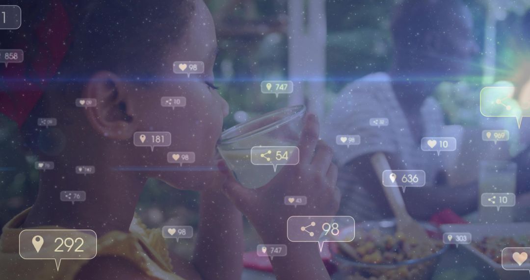 Child Engaging with Social Media Icons During Mealtime