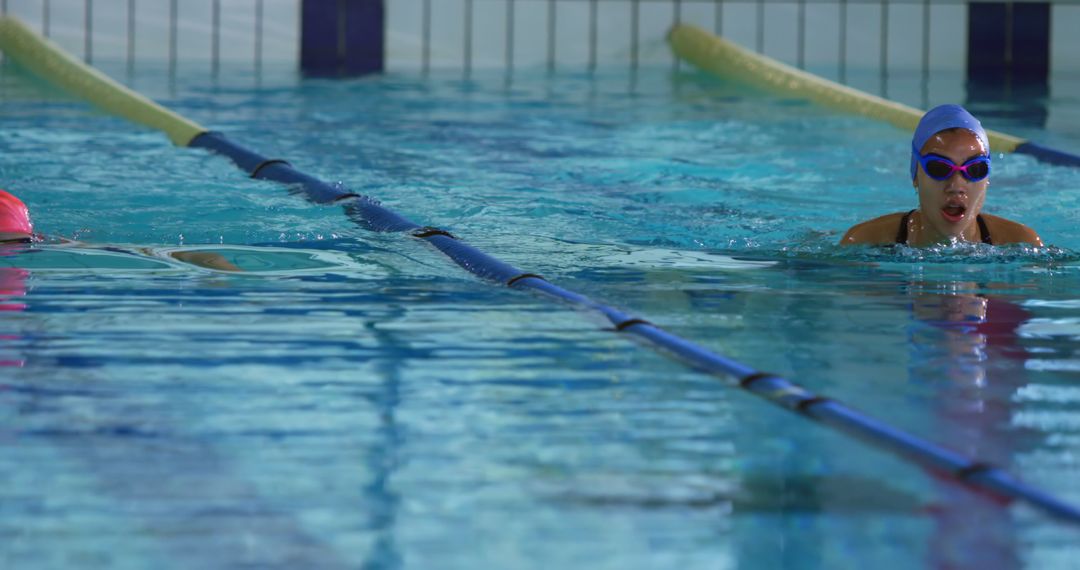 Competitive Swim Training in Indoor Pool - Free Images, Stock Photos and Pictures on Pikwizard.com