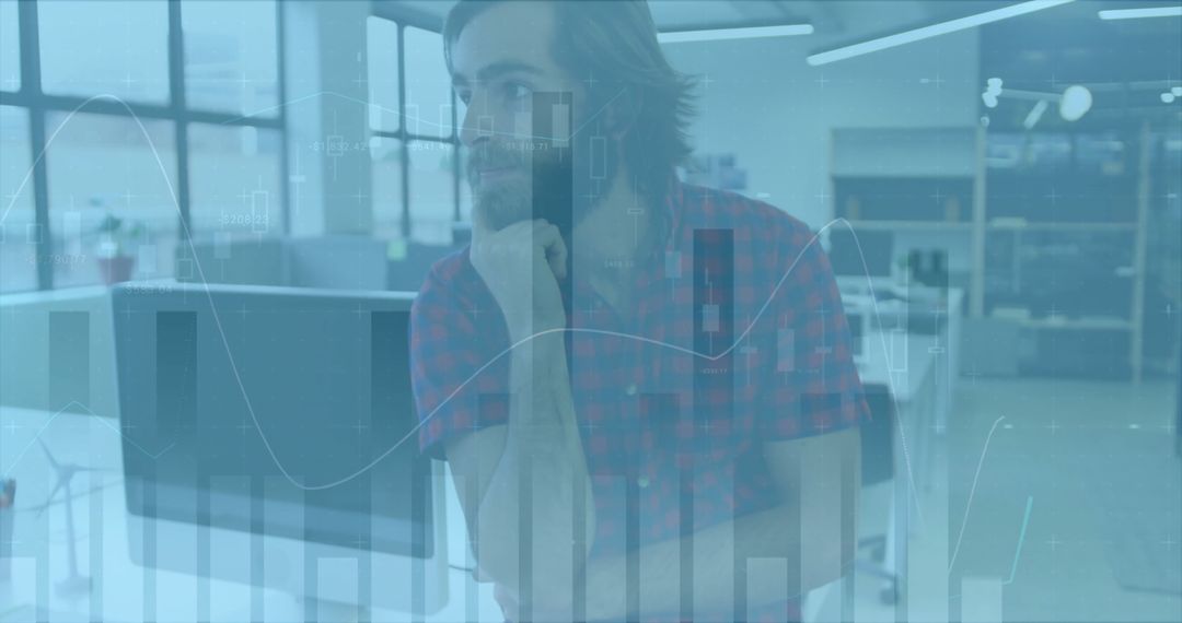 Thoughtful Businessman Analyzing Digital Financial Graphs in Modern Office