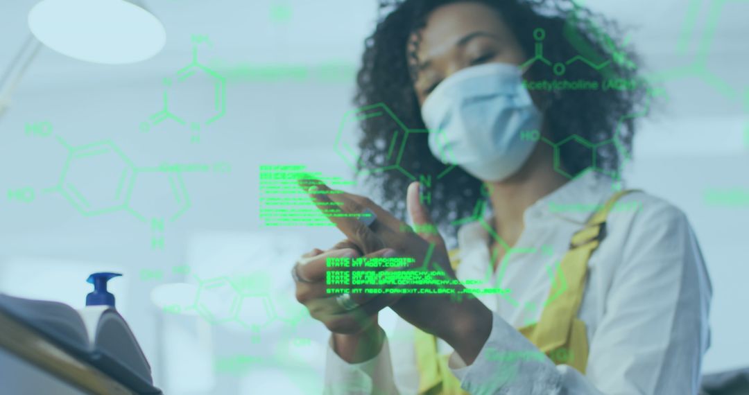 Woman Interacting With Digital Interface in Office during Pandemic