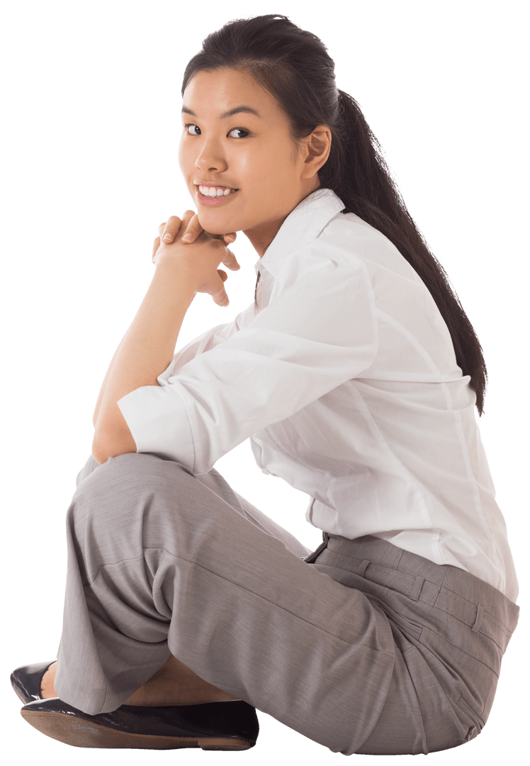 Relaxed Businesswoman Sitting Cross-Legged With Friendly Expression Transparent