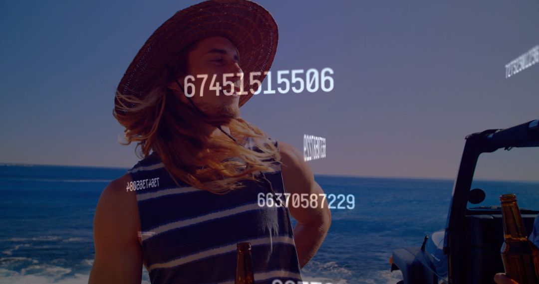 Man in Straw Hat Enjoying Coastal Adventure with Digital Data Overlay