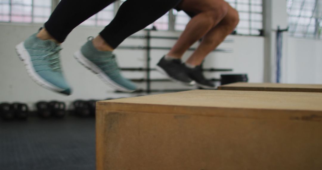 People Performing Box Jumps During Fitness Training in Gym - Free Images, Stock Photos and Pictures on Pikwizard.com