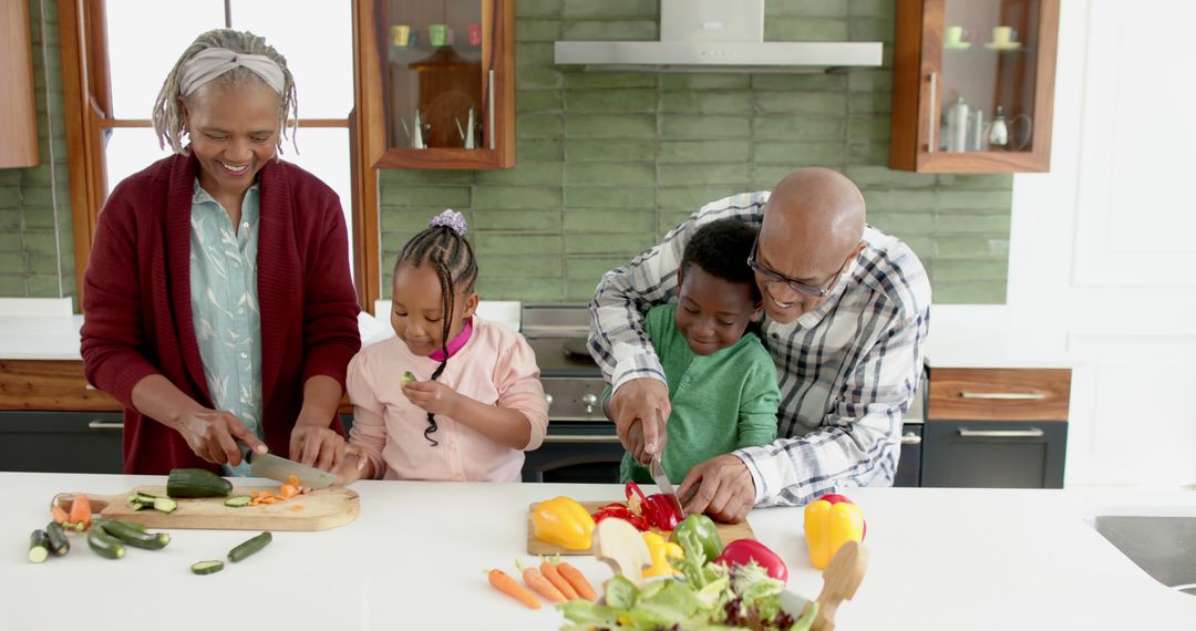 Loving African American Family Cooking Together in Kitchen - Free Images, Stock Photos and Pictures on Pikwizard.com