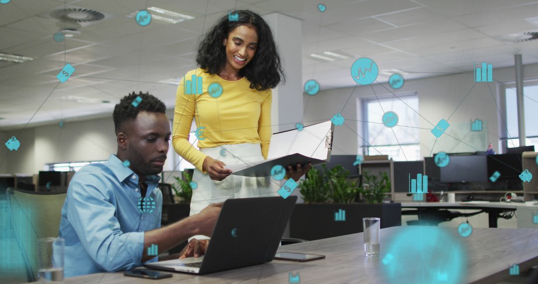 Diverse Business Professionals Analyzing Data in Modern Office