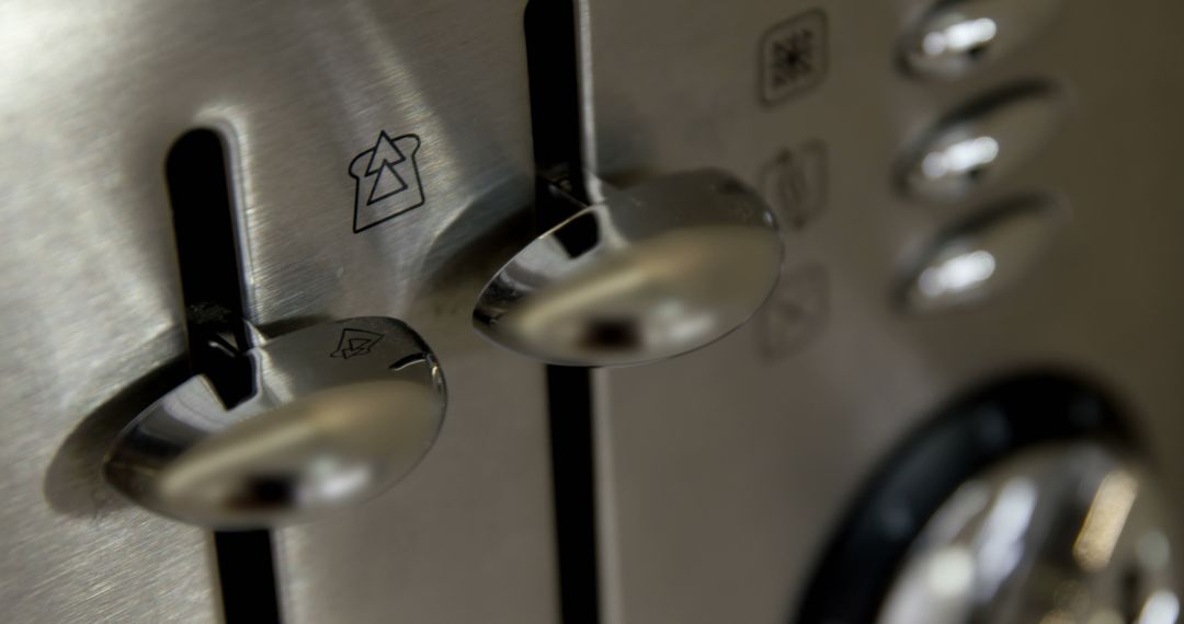 Closeup of Stainless Steel Toaster Dials and Buttons - Free Images, Stock Photos and Pictures on Pikwizard.com