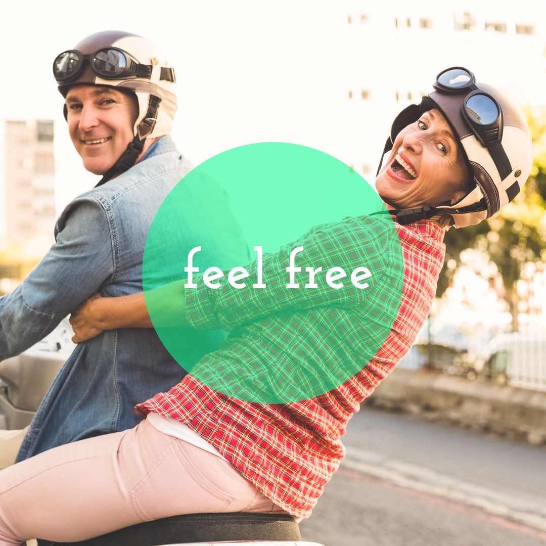 Free-Spirited Couple Enjoying Urban Scooter Ride