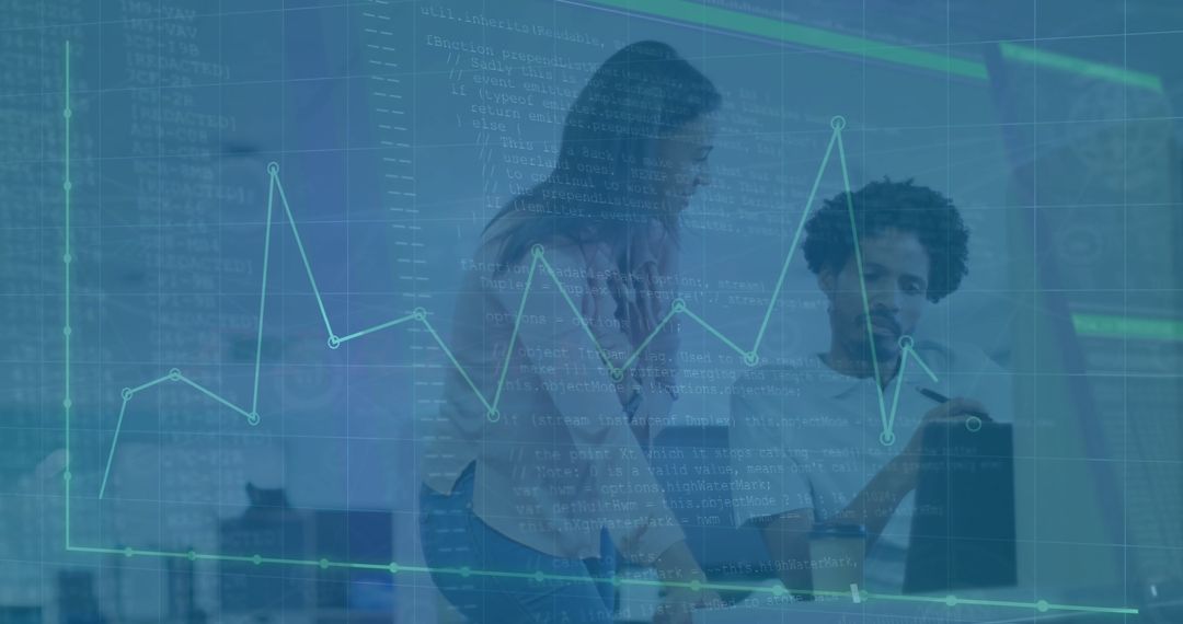 Diverse Colleagues Analyzing Data on Laptop in Modern Office