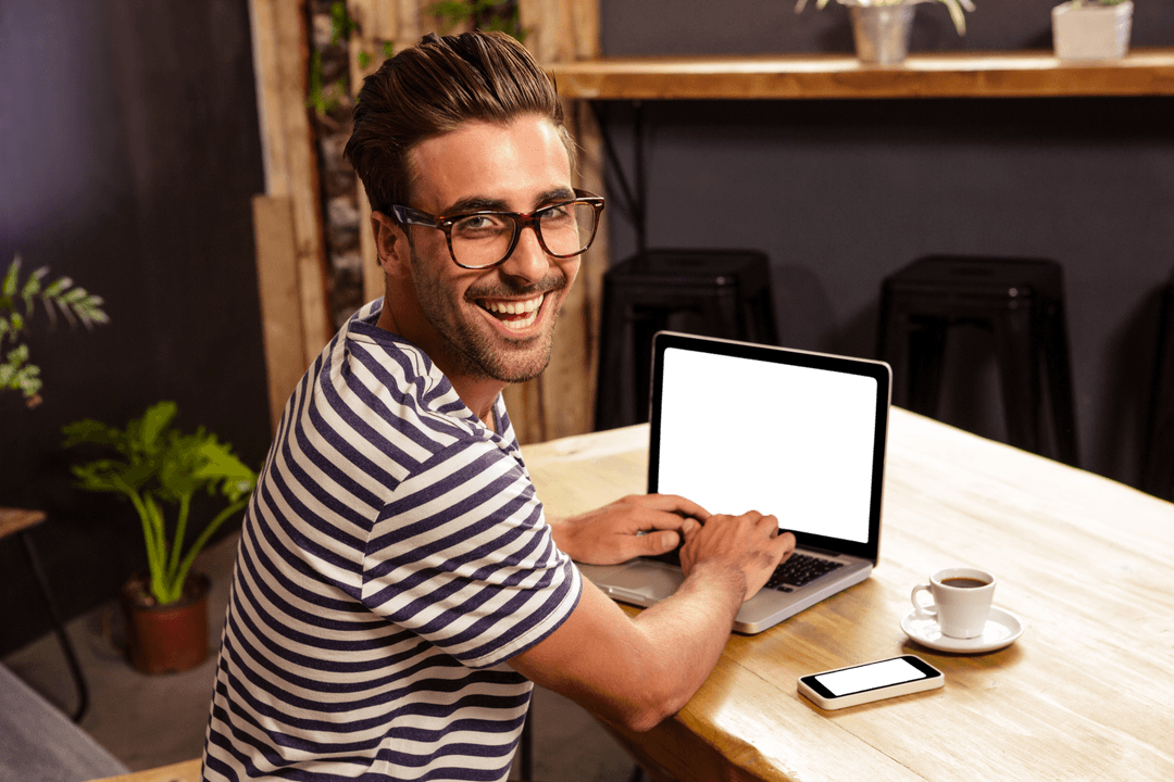 Transparent Joyful Man Using Laptop in Trendy Cafe Setting