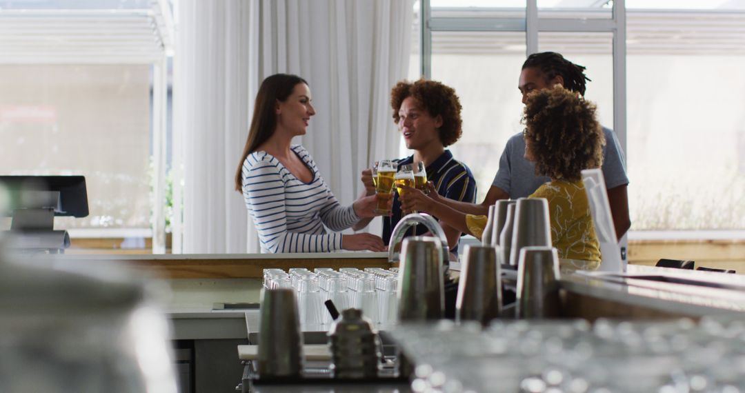 Diverse Friends Enjoying Toast in Modern Bar Setting