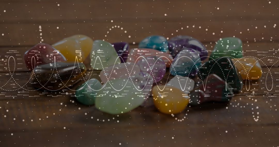 Polished Gemstones on Wooden Table with Vibrant Wave Effect