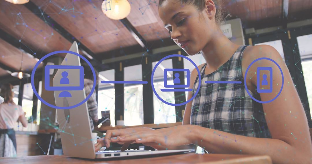 Biracial Woman Using Laptop with Digital Network Interface Overlay
