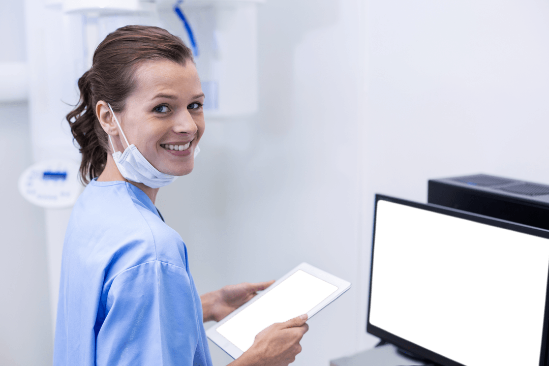 Smiling Dental Assistant with Tablet in Transparent Mask Setting