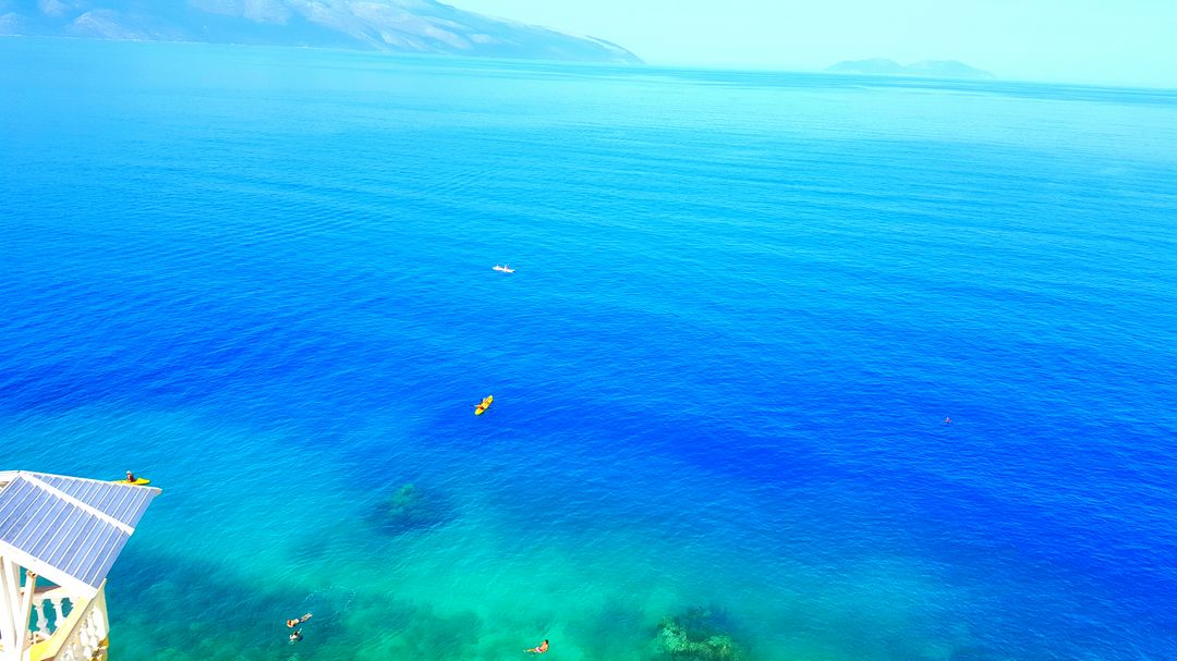 Stunning Clear Blue Ocean with Horizon Background - Free Images, Stock Photos and Pictures on Pikwizard.com
