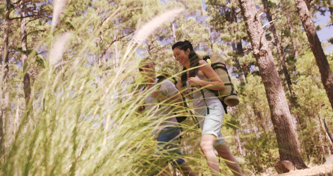 Two Happy Hikers Enjoying Day in Forest