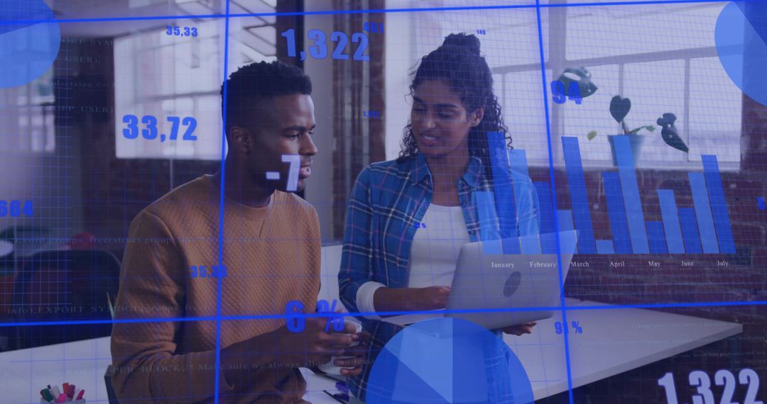 Collaborating on laptop, analyzing dashboards and charts with blue digital data overlays