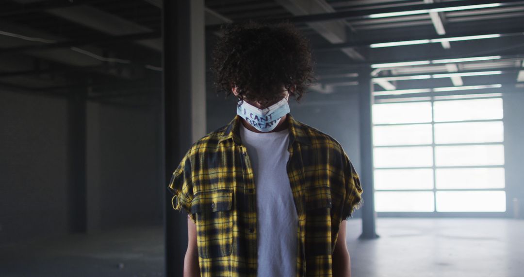 Young Man Wearing I Can't Breathe Mask, Black Lives Matter Message - Free Images, Stock Photos and Pictures on Pikwizard.com