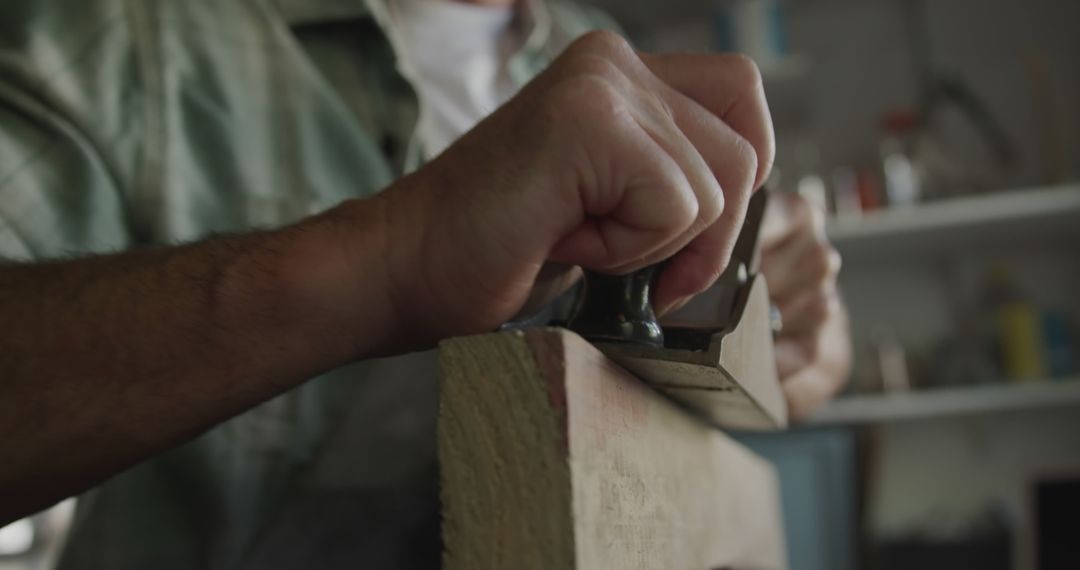 Craftsman Sharpening Plywood with Hand Plane in Workshop - Free Images, Stock Photos and Pictures on Pikwizard.com