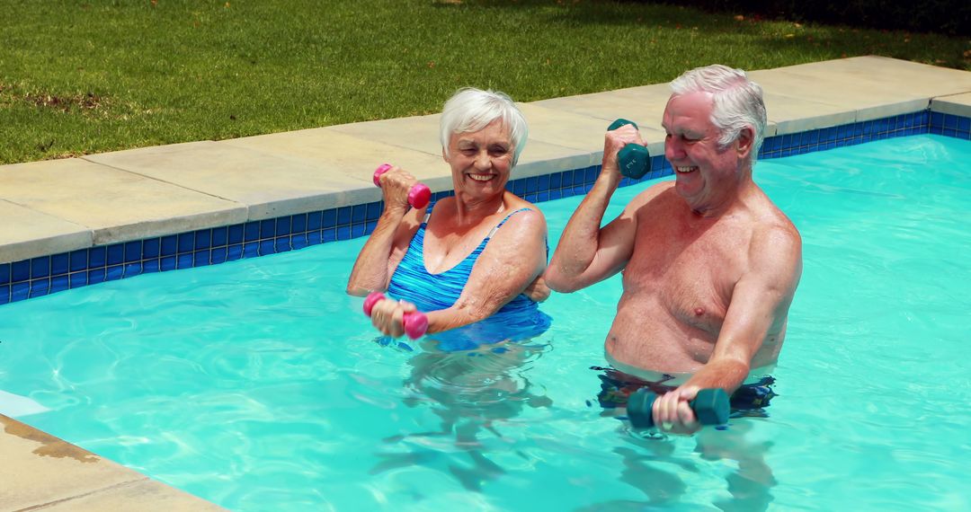 Senior Couple Exercising with Dumbbells in Outdoor Pool - Free Images, Stock Photos and Pictures on Pikwizard.com