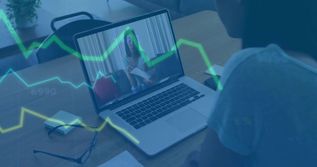 Remote Collaboration Meeting on Laptop in Home Office Environment